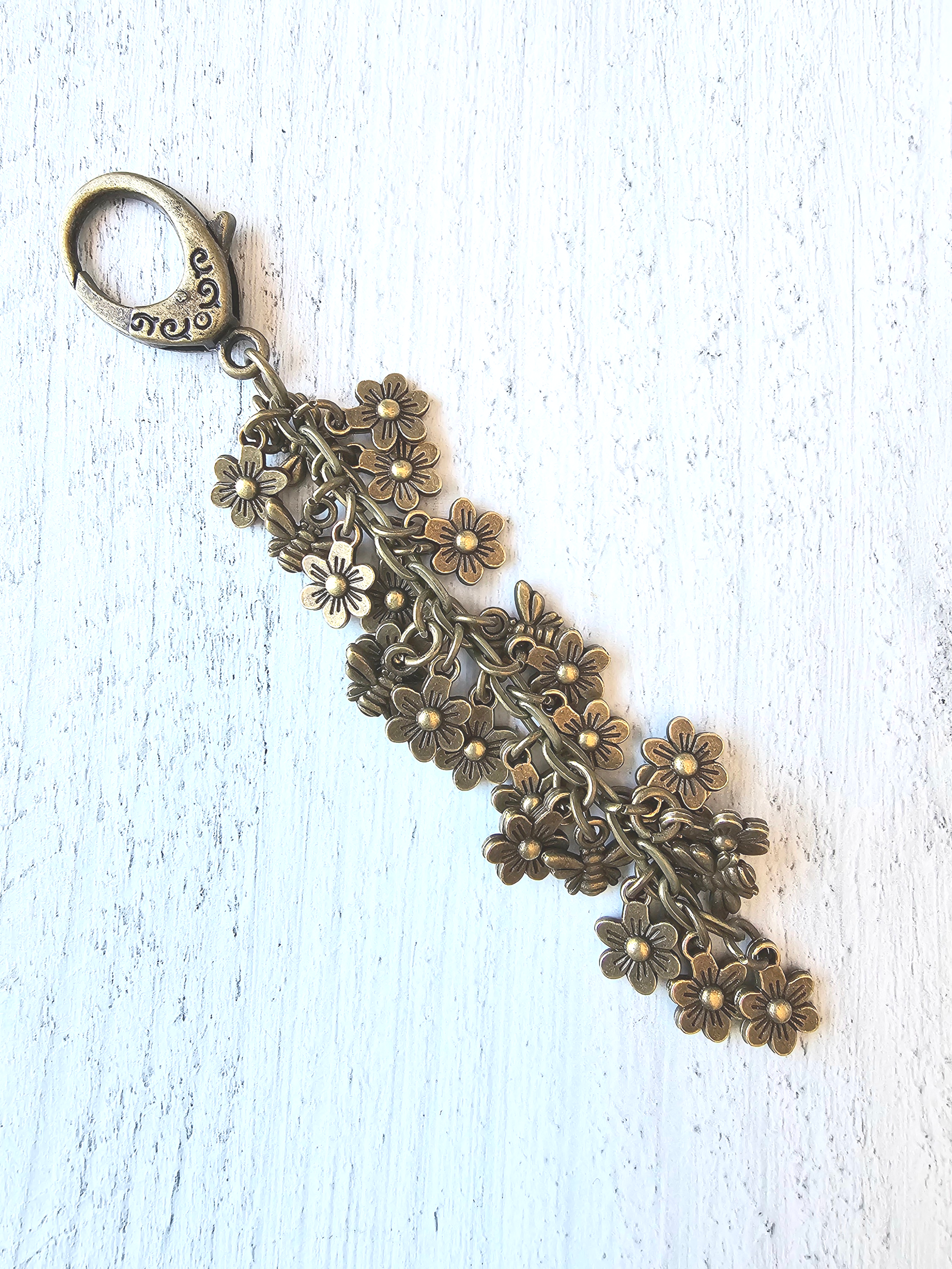 a close up of a key chain on a table