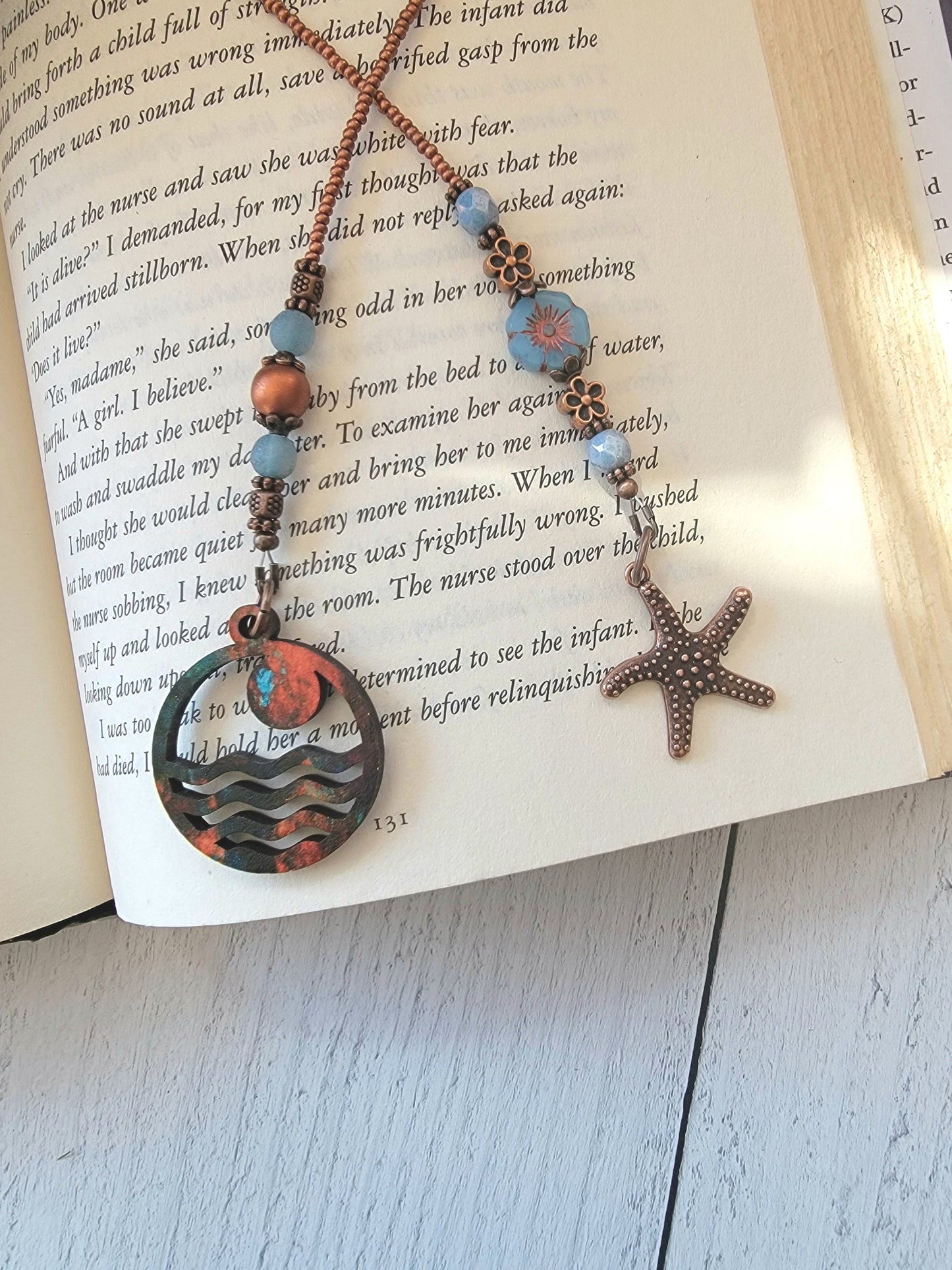 Handcrafted Beach Theme Bookmark featuring an Ocean Sunset Charm and Copper Plated Starfish