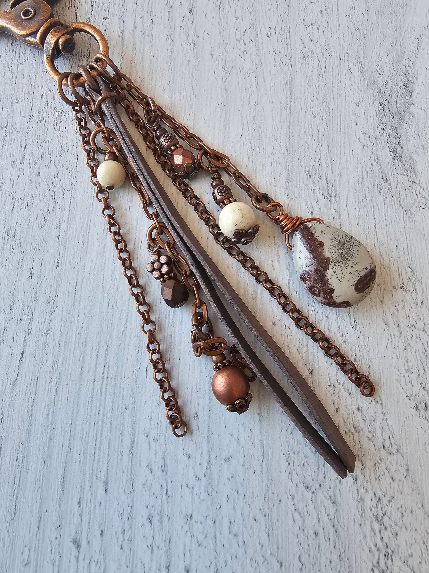 Leather and Copper Plated Tassel Bag Charm Featuring Unique Wild Horse Stone Beads and Beaded Charms