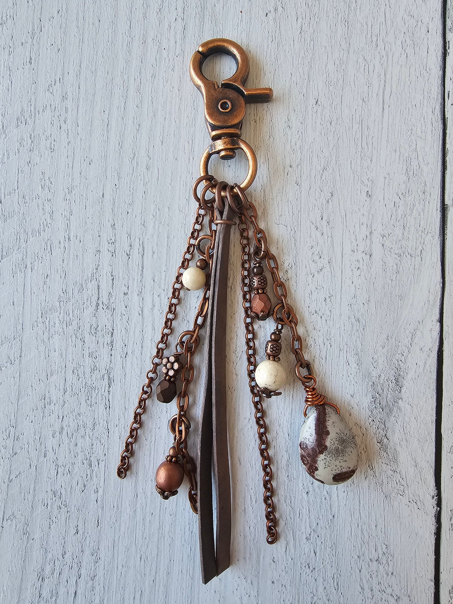 Leather and Copper Plated Tassel Bag Charm Featuring Unique Wild Horse Stone Beads and Beaded Charms