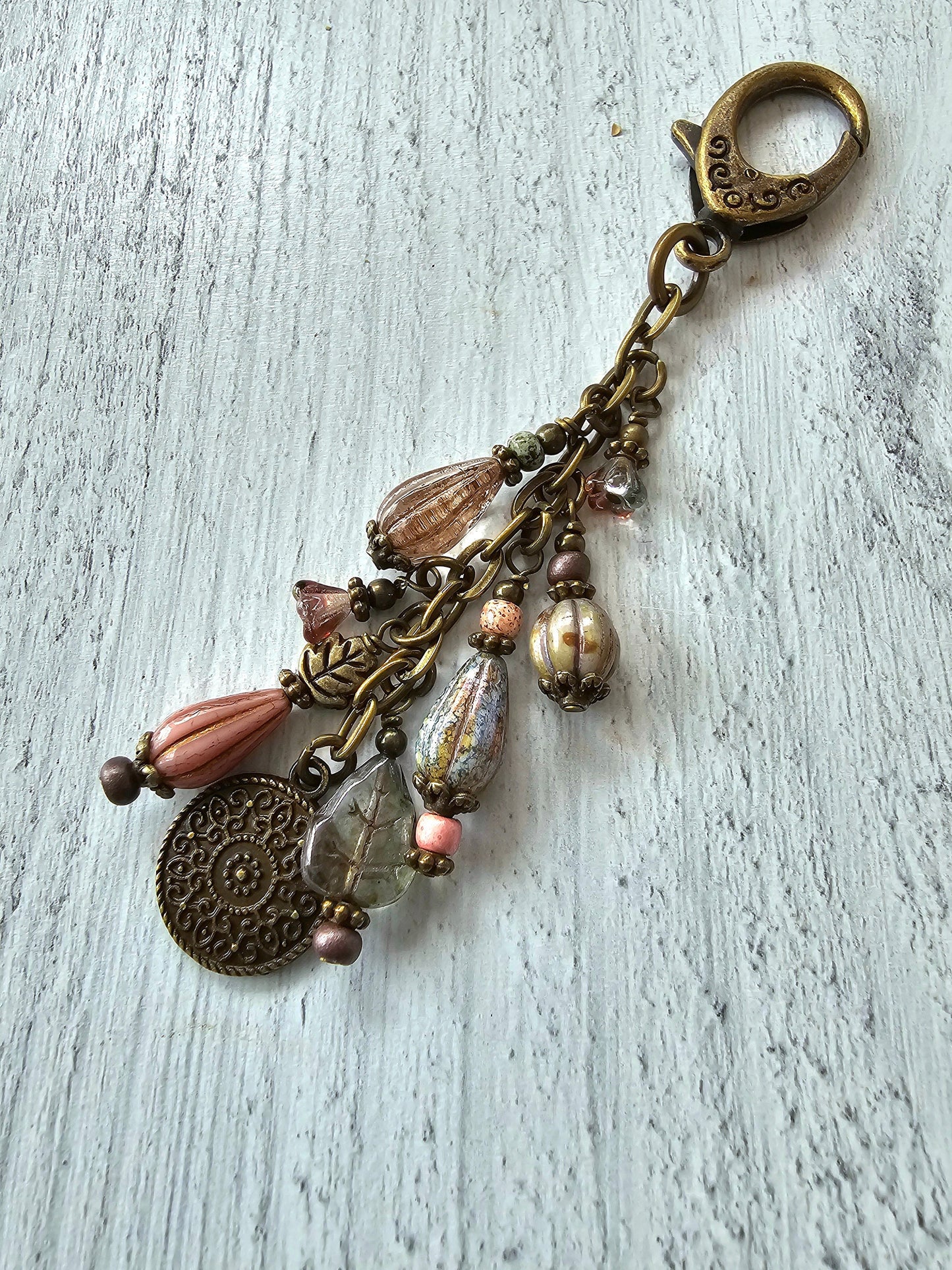 Boho Style Beaded Bag Charm Zipper Pull With Bronze Plated Charm in Rose and Green