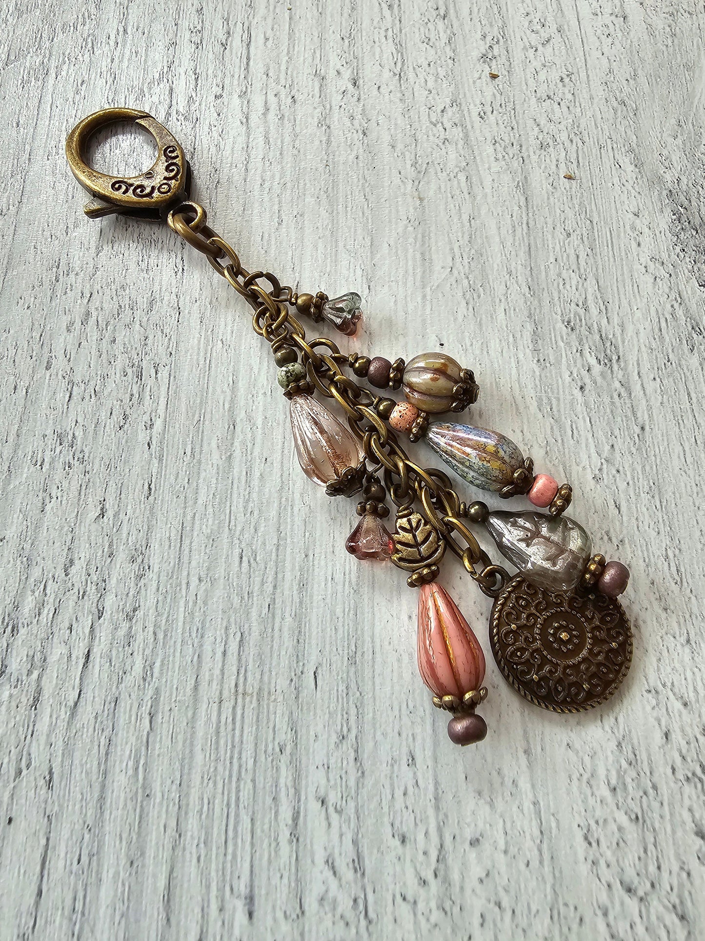 Boho Style Beaded Bag Charm Zipper Pull With Bronze Plated Charm in Rose and Green