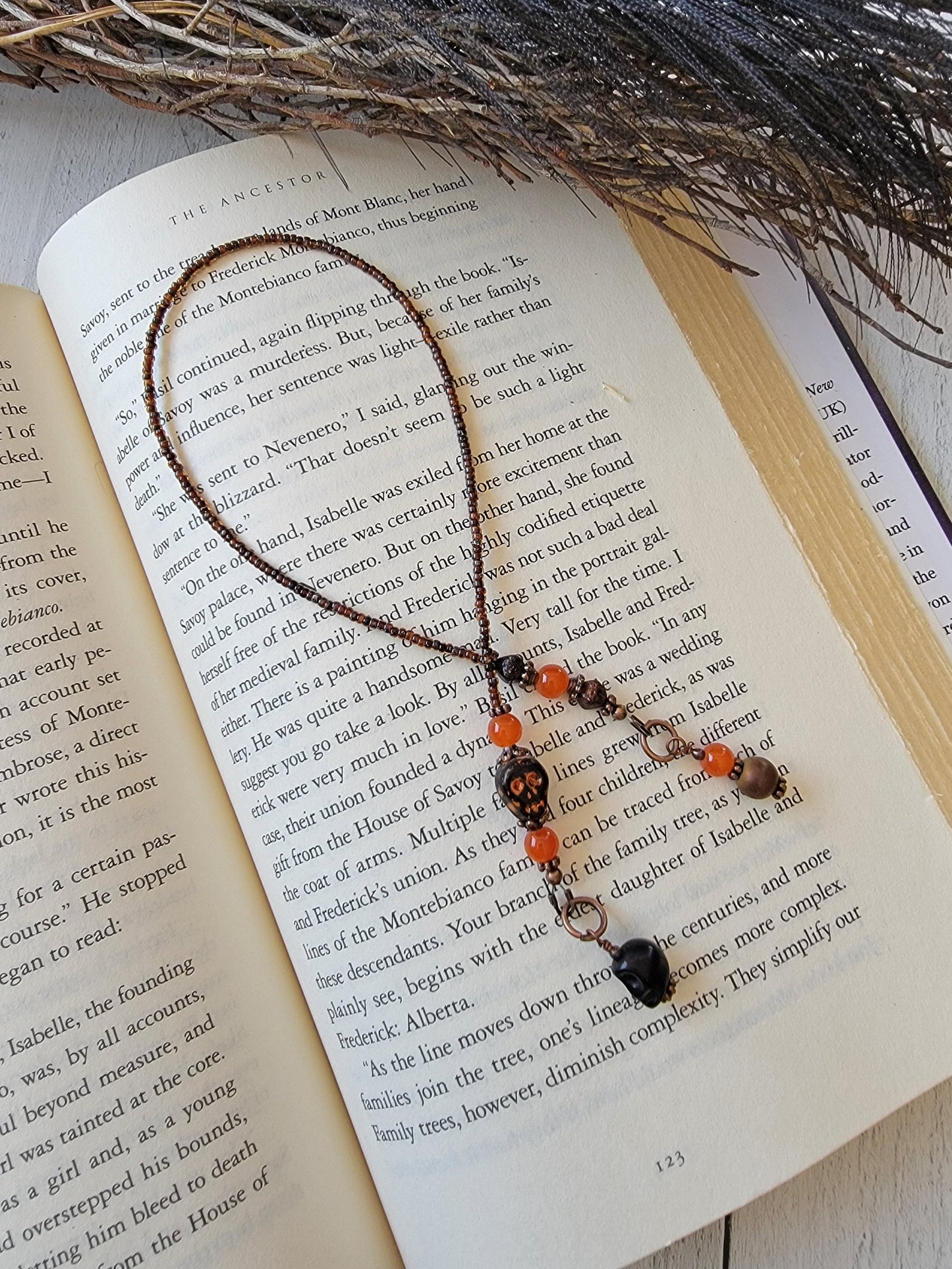 Cute Macabre Black and Orange Beaded Bookmark with Cute Glass Skull Bead - Add a Touch of Spooky Charm