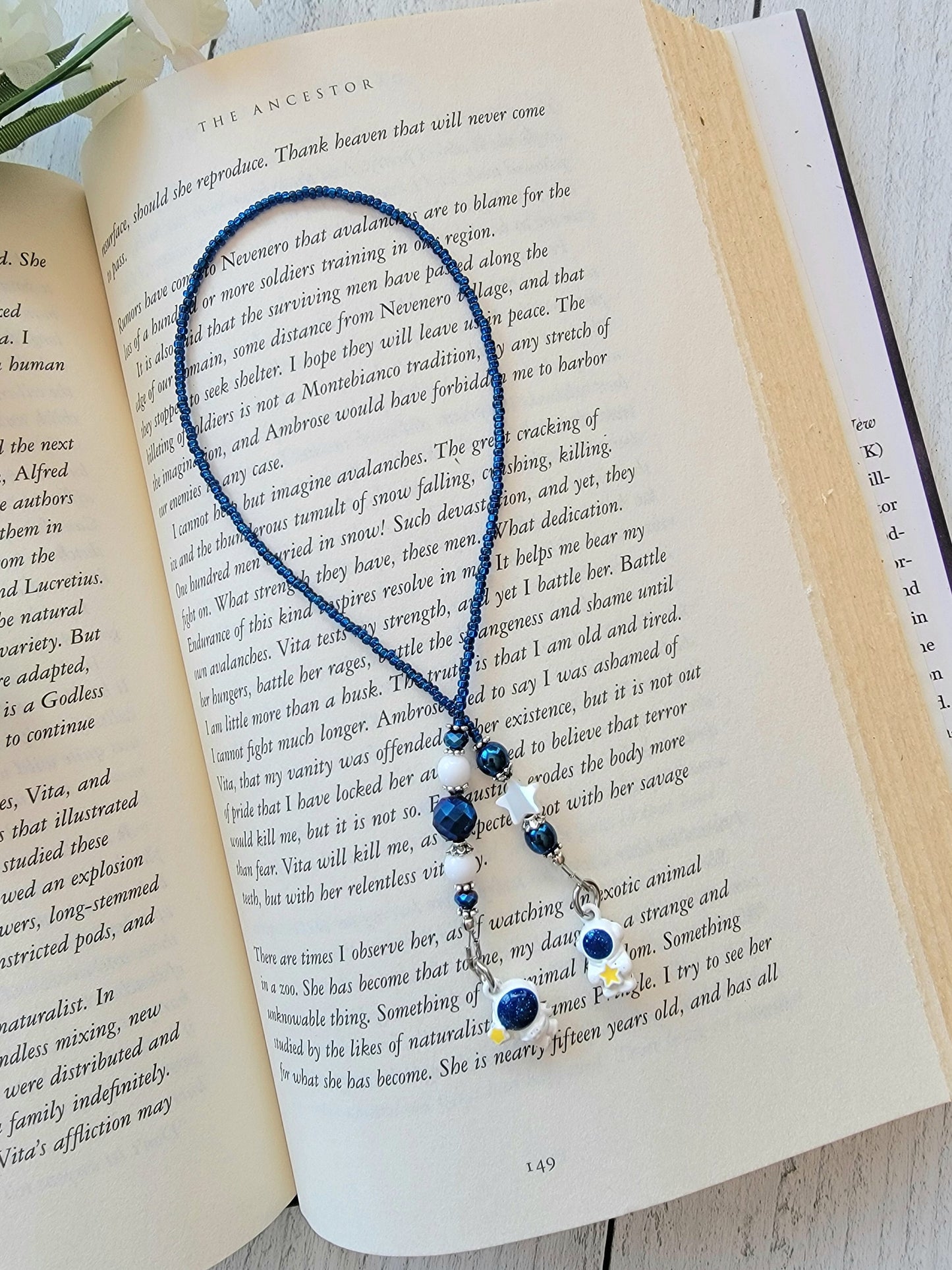 Whimsical Astronaut Charm Bookmark in Deep Blue and White