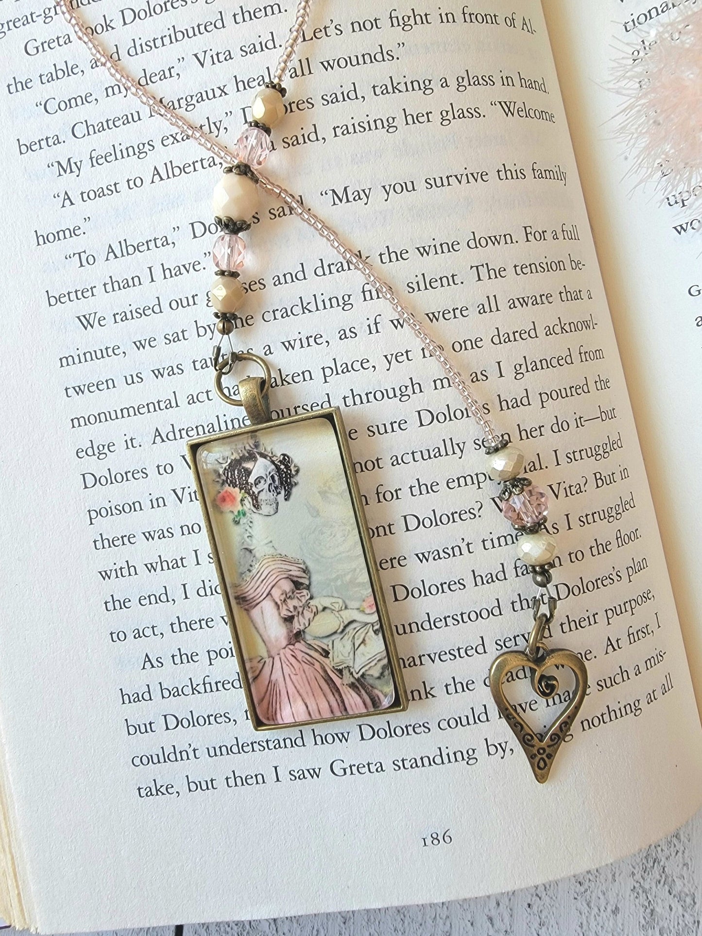 Whimsical Beaded Bookmark featuring a Skeleton in a Pink Victorian Gown
