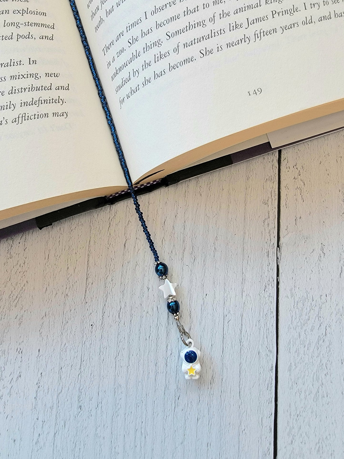 Whimsical Astronaut Charm Bookmark in Deep Blue and White