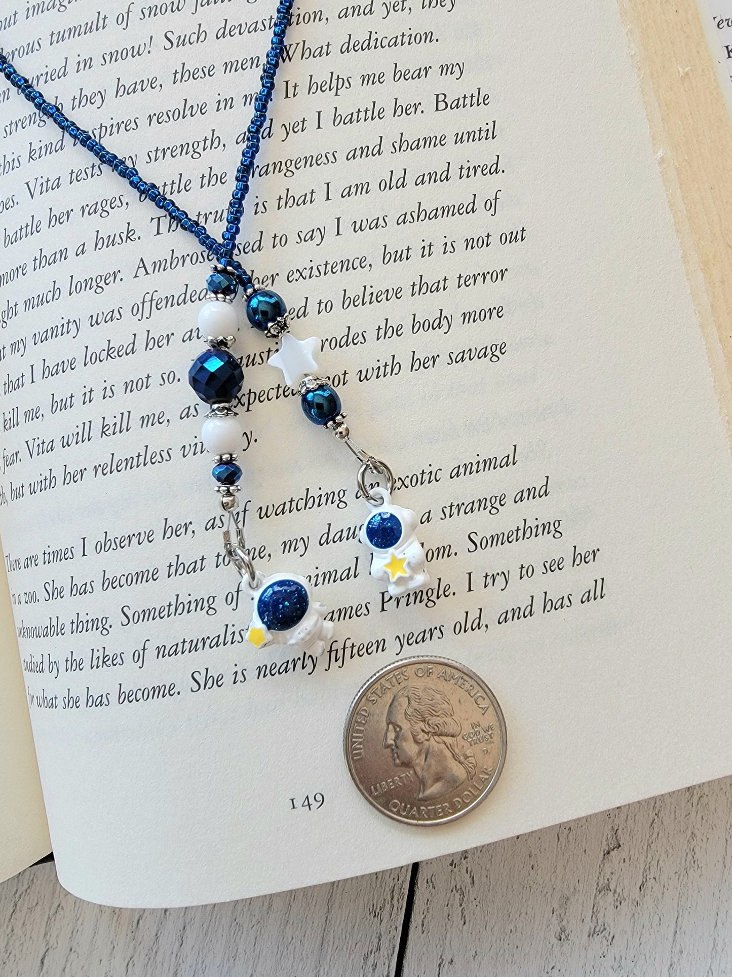 Whimsical Astronaut Charm Bookmark in Deep Blue and White