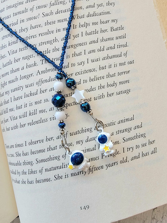 Whimsical Astronaut Charm Bookmark in Deep Blue and White